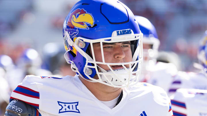 Nov 8, 2025; Tucson, Arizona, USA; Kansas Jayhawks offensive lineman Tyler Mercer (52) against the Arizona Wildcats at Arizona Stadium. Mandatory Credit: Mark J. Rebilas-Imagn Images
