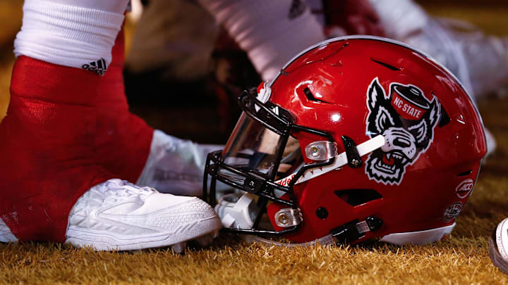 Nov 18, 2017; Winston-Salem, NC, USA; A North Carolina State Wolfpack helmet lays on the sidelines during the game against the Wake Forest Demon Deacons at BB&T Field. Mandatory Credit: Jeremy Brevard-Imagn Images