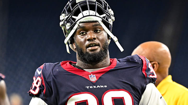 Aug 25, 2022; Houston, Texas, USA; Houston Texans defensive end Michael Dwumfour (98) exits the field after the game against the San Francisco 49ers at NRG Stadium. Mandatory Credit: Maria Lysaker-Imagn Images Aug 25, 2022; Houston, Texas, USA; Houston Texans defensive end Michael Dwumfour (98) exits the field after the game against the San Francisco 49ers at NRG Stadium. Mandatory Credit: Maria Lysaker-Imagn Images