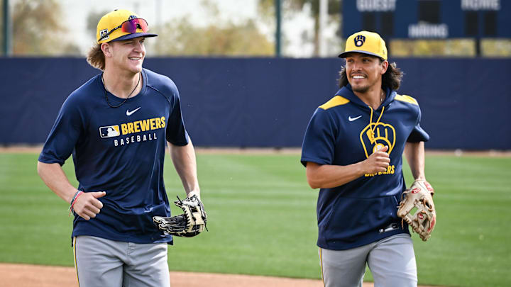 Milwaukee Brewers infielders Cooper Pratt and Anthony Seigler run off the field during spring training workouts Monday, February 17, 2025, at American Family Fields of Phoenix in Phoenix, Arizona.