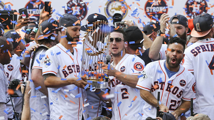 Nov 3, 2017; Houston, TX, USA; Houston Astros left fielder Marwin Gonzalez (9) and third baseman Alex Bregman (2) holds the championship trophy during the World Series championship parade and rally at Houston City Hall. Nov 3, 2017; Houston, TX, USA; Houston Astros left fielder Marwin Gonzalez (9) and third baseman Alex Bregman (2) holds the championship trophy during the World Series championship parade and rally at Houston City Hall.