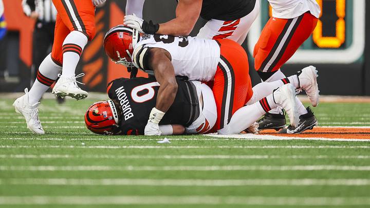 Jan 4, 2026; Cincinnati, Ohio, USA; Cleveland Browns defensive end Myles Garrett (95) sacks Cincinnati Bengals quarterback Joe Burrow (9) during the fourth quarter at Paycor Stadium. The play set a new NFL single season sack record by Garrett. Mandatory Credit: Joseph Maiorana-Imagn Images Jan 4, 2026; Cincinnati, Ohio, USA; Cleveland Browns defensive end Myles Garrett (95) sacks Cincinnati Bengals quarterback Joe Burrow (9) during the fourth quarter at Paycor Stadium. The play set a new NFL single season sack record by Garrett. Mandatory Credit: Joseph Maiorana-Imagn Images