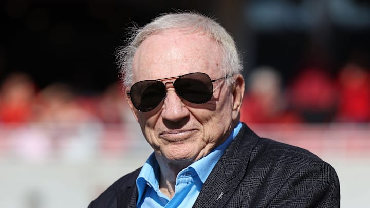 Nov 16, 2024; Fayetteville, Arkansas, USA; Dallas Cowboys owner and member of the 1964 Arkansas Razorbacks National Championship team, Jerry Jones, looks on as the team is honored during the first half against the Texas Longhorns at Donald W. Reynolds Razorback Stadium. Mandatory Credit: Nelson Chenault-Imagn Images