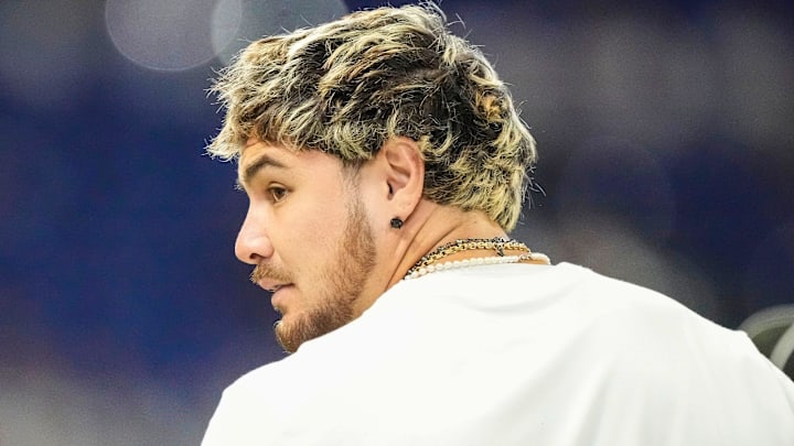 Indianapolis Colts defensive end Laiatu Latu (97) walks onto the field Sunday, Sept. 14, 2025, ahead of the game against the Denver Broncos at Lucas Oil Stadium in Indianapolis. Indianapolis Colts defensive end Laiatu Latu (97) walks onto the field Sunday, Sept. 14, 2025, ahead of the game against the Denver Broncos at Lucas Oil Stadium in Indianapolis.