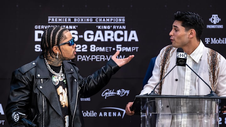 Gervonta "Tank" Davis and Ryan Garcia argue as they address the media on March 9, 2023.