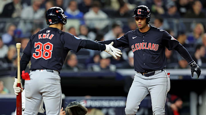 Oct 14, 2024; Bronx, New York, USA; Cleveland Guardians shortstop Brayan Rocchio (4) celebrates with outfielder Steven Kwan (38) after hitting a solo home run during the sixth inning against the New York Yankees in game one of the ALCS for the 2024 MLB Playoffs at Yankee Stadium. Mandatory Credit: Brad Penner-Imagn Images