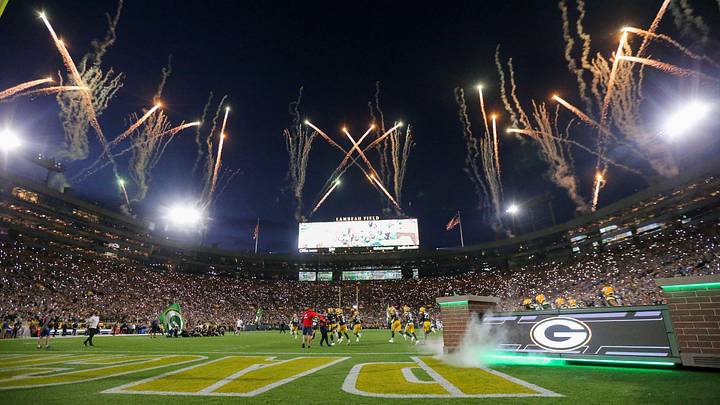 Fireworks are fired off as the Green Bay Packers run out of the tunnel before their game against the Detroit Lions in 2023. Fireworks are fired off as the Green Bay Packers run out of the tunnel before their game against the Detroit Lions in 2023.