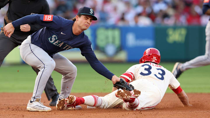 Los Angeles Angels outfielder Chris Taylor (33) steals second during a game against the Seattle Mariners on June 6 at Angel Stadium.