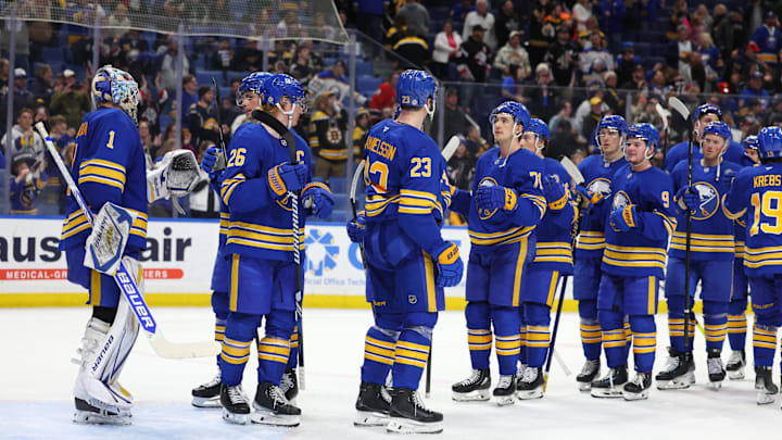 Apr 6, 2025; Buffalo, New York, USA;  The Buffalo Sabres celebrate a win over the Boston Bruins at KeyBank Center. Mandatory Credit: Timothy T. Ludwig-Imagn Images