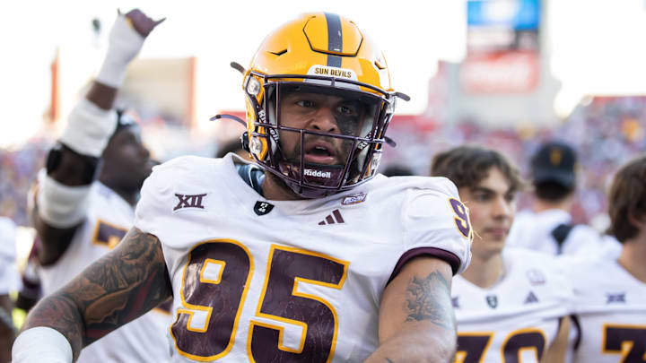 Nov 30, 2024; Tucson, Arizona, USA; Arizona State Sun Devils defensive lineman Justin Wodtly (95) against the Arizona Wildcats during the Territorial Cup at Arizona Stadium. Mandatory Credit: Mark J. Rebilas-Imagn Images Nov 30, 2024; Tucson, Arizona, USA; Arizona State Sun Devils defensive lineman Justin Wodtly (95) against the Arizona Wildcats during the Territorial Cup at Arizona Stadium. Mandatory Credit: Mark J. Rebilas-Imagn Images