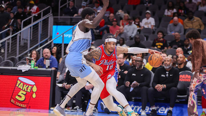 Mar 23, 2025; Atlanta, Georgia, USA; Philadelphia 76ers forward Chuma Okeke (18) is defended by Atlanta Hawks forward Mouhamed Gueye (18) in the first quarter at State Farm Arena. Mandatory Credit: Brett Davis-Imagn Images