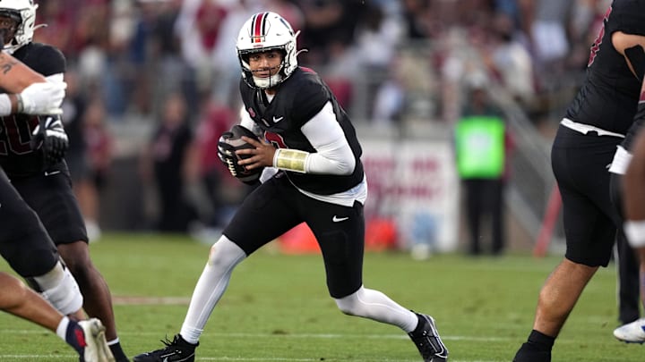 Oct 19, 2024; Stanford, California, USA; Stanford Cardinal quarterback Elijah Brown (2) carries the ball against the Southern Methodist Mustangs during the second quarter at Stanford Stadium. Mandatory Credit: Darren Yamashita-Imagn Images Oct 19, 2024; Stanford, California, USA; Stanford Cardinal quarterback Elijah Brown (2) carries the ball against the Southern Methodist Mustangs during the second quarter at Stanford Stadium. Mandatory Credit: Darren Yamashita-Imagn Images