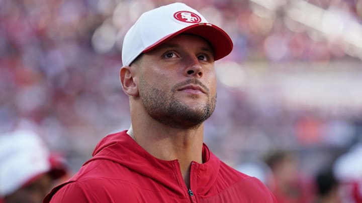 San Francisco 49ers defensive lineman Nick Bosa (97) watches from the sidelines in the first quarter against the Denver Broncos at Levi's Stadium.