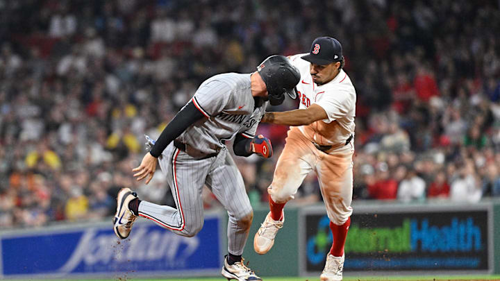 May 2, 2025; Boston, Massachusetts, USA; Boston Red Sox second baseman David Hamilton (17) chases Minnesota Twins second baseman Edouard Julien (47) to tag him out during the seventh inning at Fenway Park. Mandatory Credit: Eric Canha-Imagn Images May 2, 2025; Boston, Massachusetts, USA; Boston Red Sox second baseman David Hamilton (17) chases Minnesota Twins second baseman Edouard Julien (47) to tag him out during the seventh inning at Fenway Park. Mandatory Credit: Eric Canha-Imagn Images