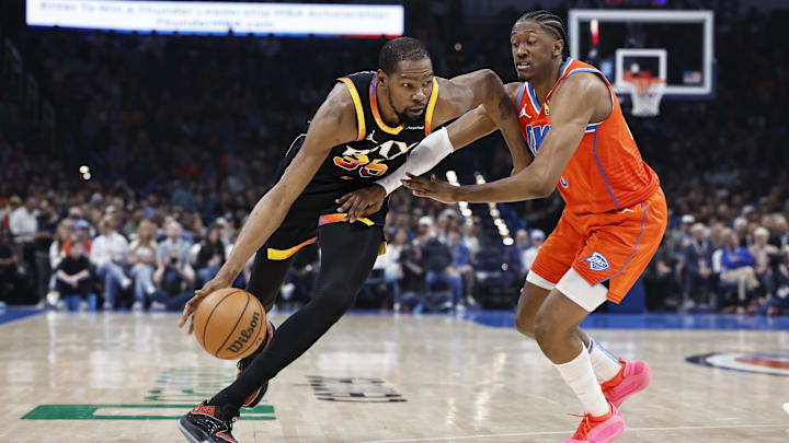 Mar 29, 2024; Oklahoma City, Oklahoma, USA; Phoenix Suns forward Kevin Durant (35) moves the ball as Oklahoma City Thunder forward Jalen Williams (8) defends during the first half at Paycom Center. Mandatory Credit: Alonzo Adams-Imagn Images Mar 29, 2024; Oklahoma City, Oklahoma, USA; Phoenix Suns forward Kevin Durant (35) moves the ball as Oklahoma City Thunder forward Jalen Williams (8) defends during the first half at Paycom Center. Mandatory Credit: Alonzo Adams-Imagn Images