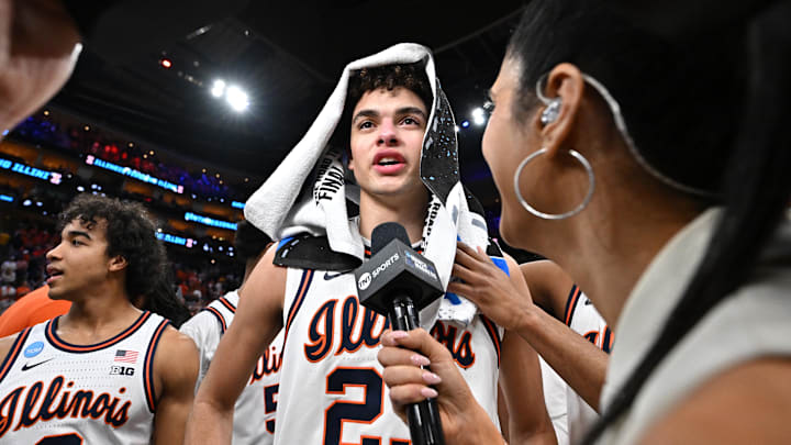 Mar 28, 2026; Houston, TX, USA; Illinois Fighting Illini guard Keaton Wagler (23) speaks to media after defeating the Iowa Hawkeyes in an Elite Eight game of the South Regional of the men's 2026 NCAA Tournament at Toyota Center. Mandatory Credit: Maria Lysaker-Imagn Images