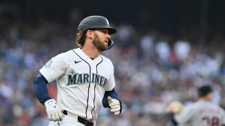 Aug 5, 2026; Seattle, Washington, USA; Seattle Mariners designated hitter Taylor Ward (27) runs towards first base after hitting a single against the Detroit Tigers during the third inning at T-Mobile Park. Mandatory Credit: Steven Bisig-Imagn Images