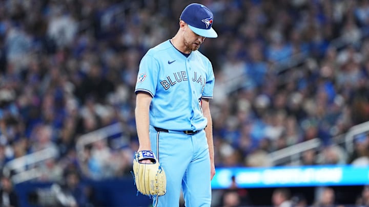 Apr 11, 2026: Toronto Blue Jays starting pitcher Eric Lauer (56) walks towards the dugout against the Minnesota Twins during the third inning at Rogers Centre. 