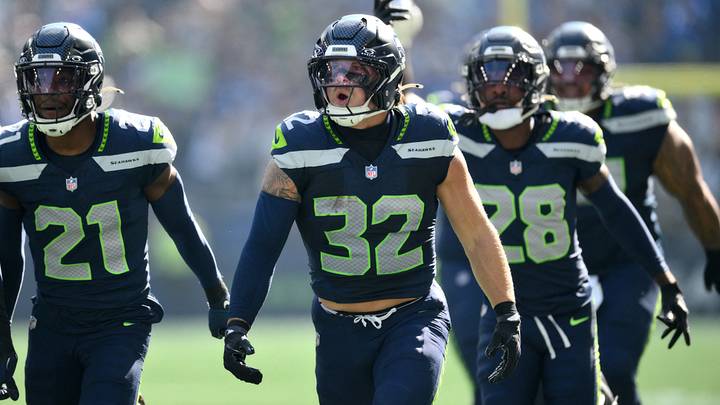 Oct 4, 2026; Seattle, Washington, USA; Seattle Seahawks linebacker Drake Thomas (32) celebrates after an interception against the Los Angeles Chargers during the first half at Lumen Field. Oct 4, 2026; Seattle, Washington, USA; Seattle Seahawks linebacker Drake Thomas (32) celebrates after an interception against the Los Angeles Chargers during the first half at Lumen Field.