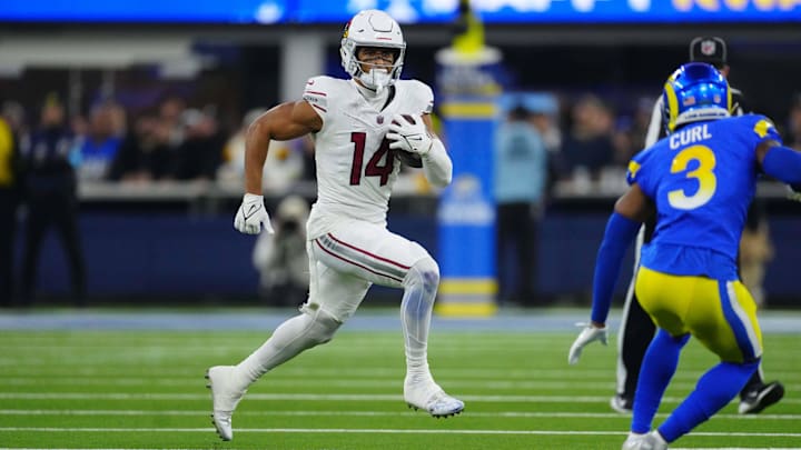 Dec 28, 2024; Inglewood, California, USA; Arizona Cardinals wide receiver Michael Wilson (14) carries the ball against the Los Angeles Rams in the second half at SoFi Stadium. Mandatory Credit: Kirby Lee-Imagn Images