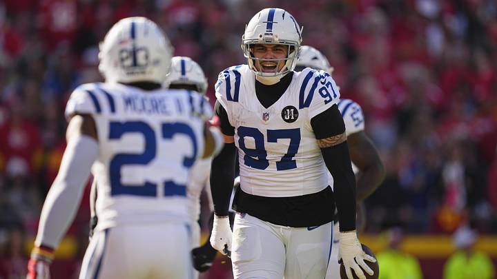 Indianapolis Colts defensive end Laiatu Latu (97) celebrates after an interception against the Kansas City Chiefs in the first quarter at GEHA Field at Arrowhead Stadium.