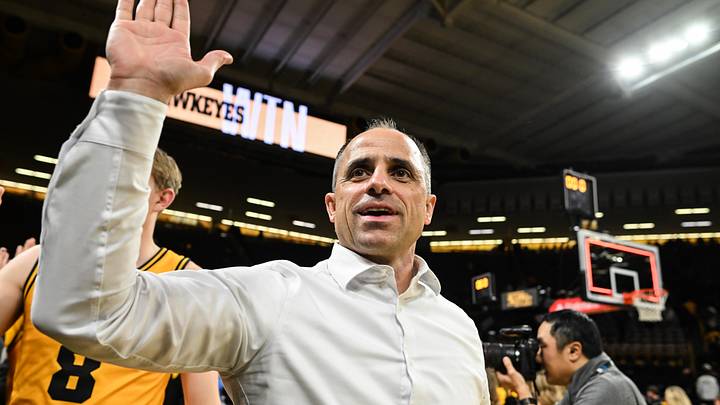 Feb 25, 2026; Iowa City, Iowa, USA; Iowa Hawkeyes head coach Ben McCollum reacts with fans after the game against the Ohio State Buckeyes at Carver-Hawkeye Arena. Mandatory Credit: Jeffrey Becker-Imagn Images Feb 25, 2026; Iowa City, Iowa, USA; Iowa Hawkeyes head coach Ben McCollum reacts with fans after the game against the Ohio State Buckeyes at Carver-Hawkeye Arena. Mandatory Credit: Jeffrey Becker-Imagn Images