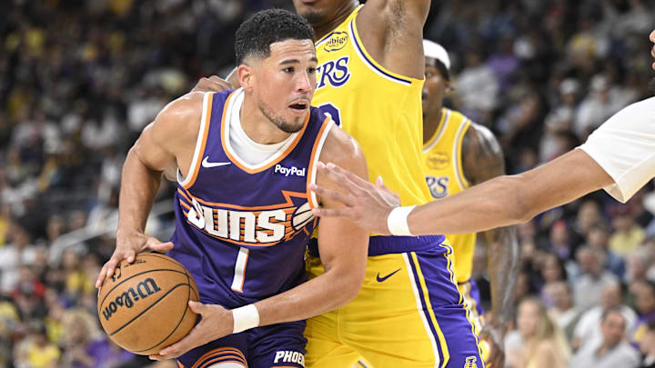 Oct 3, 2025; Palm Desert, California, USA; Los Angeles Lakers forward Rui Hachimura (28) defends against Phoenix Suns guard Devin Booker (1) during the second half at Acrisure Arena. Mandatory Credit: Denis Poroy-Imagn Images Oct 3, 2025; Palm Desert, California, USA; Los Angeles Lakers forward Rui Hachimura (28) defends against Phoenix Suns guard Devin Booker (1) during the second half at Acrisure Arena. Mandatory Credit: Denis Poroy-Imagn Images