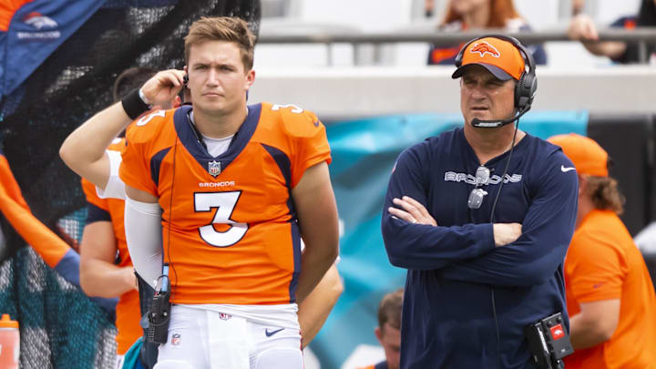 Sep 19, 2021; Jacksonville, Florida, USA; Denver Broncos quarterback Drew Lock (3) and quarterbacks coach Mike Shula against the Jacksonville Jaguars at TIAA Bank Field. Mandatory Credit: Mark J. Rebilas-Imagn Images