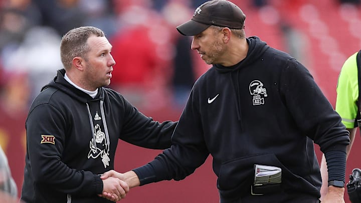 Nov 1, 2025; Ames, Iowa, USA; Arizona State Sun Devils head coach Kenny Dillingham and Iowa State Cyclones head coach Matt Campbell shake hands after the game at Jack Trice Stadium. Mandatory Credit: Reese Strickland-Imagn Images