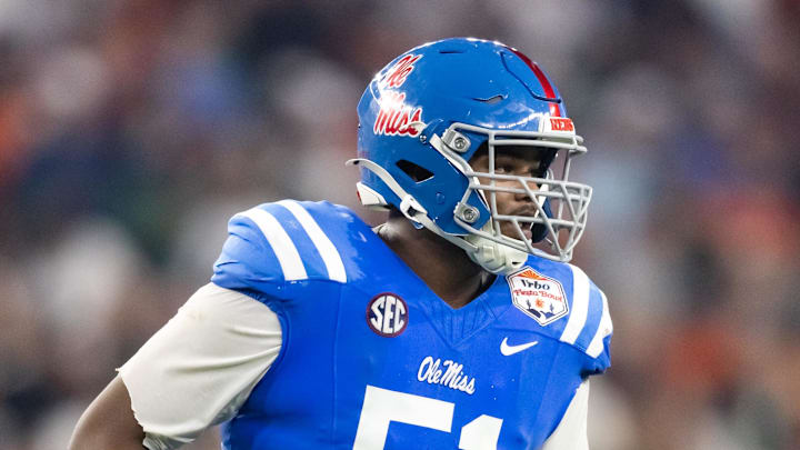 Jan 8, 2026; Glendale, AZ, USA; Mississippi Rebels defensive tackle Zxavian Harris (51) against the Miami Hurricanes during the 2026 Fiesta Bowl and semifinal game of the College Football Playoff at State Farm Stadium. Mandatory Credit: Mark J. Rebilas-Imagn Images