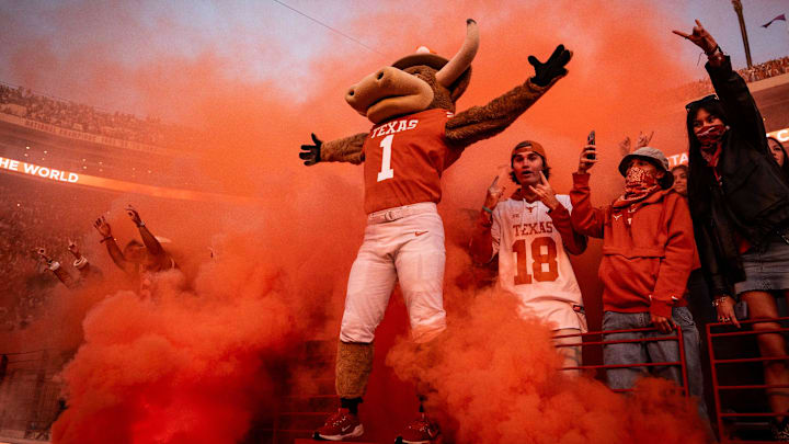 Texas mascot Hook 'Em stands in front of the student section as smoke billows onto the field between the third and fourth quarter as the Texas Longhorns play the Clemson Tigers.