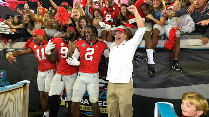 Georgia Bulldogs head coach Kirby Smart celebrates with his players and fans after their victory over Florida. The annual Georgia vs Florida football rivalry was held at TIAA Bank Field in Jacksonville, FL Saturday, October 29, 2022. The Bulldogs went in at halftime with a 28 to 3 lead over the Gators and won with a final score of 42 to 20. [Bob Self/Florida Times-Union]

Jki 102822 Bs Georgia Vs Florida Football Game 2nd Half 06