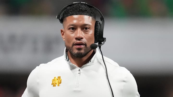 Jan 20, 2025; Atlanta, GA, USA; Notre Dame Fighting Irish head coach Marcus Freeman in the second half in the CFP National Championship college football game against the Ohio State Buckeyes at Mercedes-Benz Stadium. Jan 20, 2025; Atlanta, GA, USA; Notre Dame Fighting Irish head coach Marcus Freeman in the second half in the CFP National Championship college football game against the Ohio State Buckeyes at Mercedes-Benz Stadium.