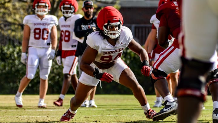 Oklahoma defensive end Kenny Ozowalu competes at practice.