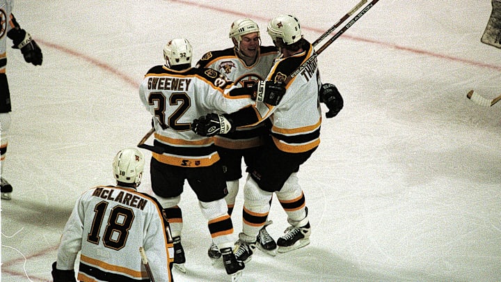 Kyle McLaren, Sergei Samsonov, and Joe Thornton—three top-10 draft picks who shaped the Boston Bruins—stand with Don Sweeney, now the GM set to make another top-10 selection in the 2025 NHL Draft.