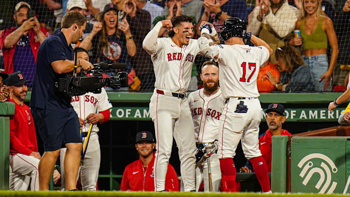 Sep 9, 2024; Boston, Massachusetts, USA; Boston Red Sox designated hitter Tyler O'Neill (17) is congratulated by left fielder Jarren Duran (16) after hitting a home run against the Baltimore Orioles in the third inning at Fenway Park. Mandatory Credit: David Butler II-Imagn Images