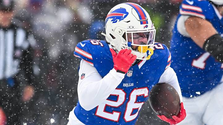 Dec 7, 2025; Orchard Park, New York, USA; Buffalo Bills running back Ty Johnson (26) runs the ball against the Cincinnati Bengals in the first quarter at Highmark Stadium. Dec 7, 2025; Orchard Park, New York, USA; Buffalo Bills running back Ty Johnson (26) runs the ball against the Cincinnati Bengals in the first quarter at Highmark Stadium.