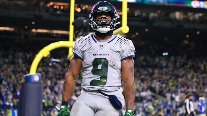 Dec 18, 2025; Seattle, Washington, USA; Seattle Seahawks running back Kenneth Walker III (9) celebrates after scoring a touchdown against the Los Angeles Rams in the second half at Lumen Field.