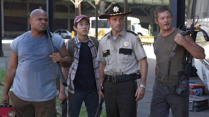 Andrew Lincoln, Norman Reedus, Steven Yeun, and IronE Singleton in The Walking Dead season 1 Andrew Lincoln, Norman Reedus, Steven Yeun, and IronE Singleton in The Walking Dead season 1