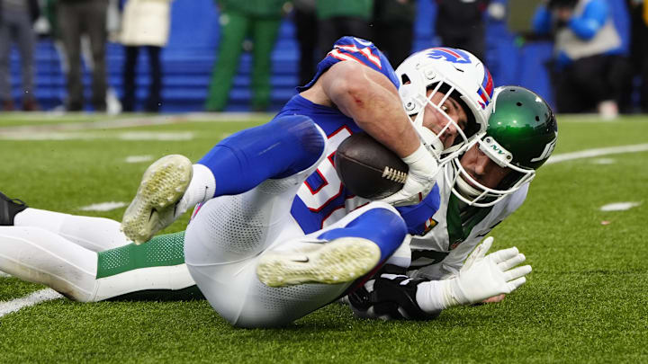 Dec 29, 2024; Orchard Park, New York, USA; Buffalo Bills linebacker Matt Milano (58) recovers after fumble by New York Jets wide receiver Garrett Wilson (not pictured)