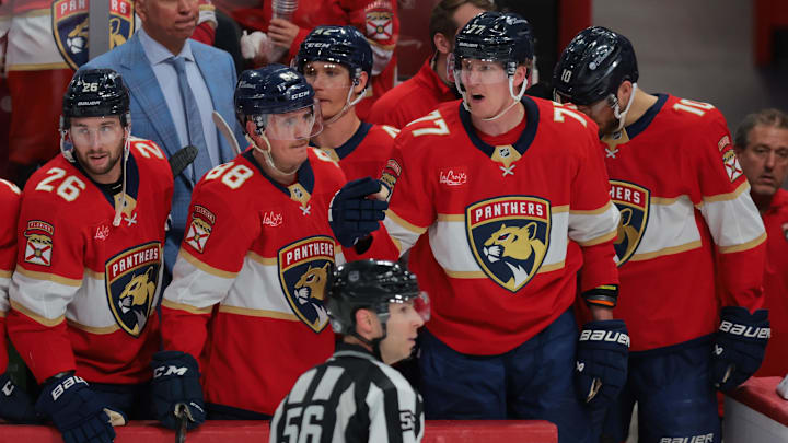 Mar 30, 2025; Sunrise, Florida, USA; Florida Panthers defenseman Niko Mikkola (77) reacts from the bench after the game against the Montreal Canadiens at Amerant Bank Arena. Mandatory Credit: Sam Navarro-Imagn Images