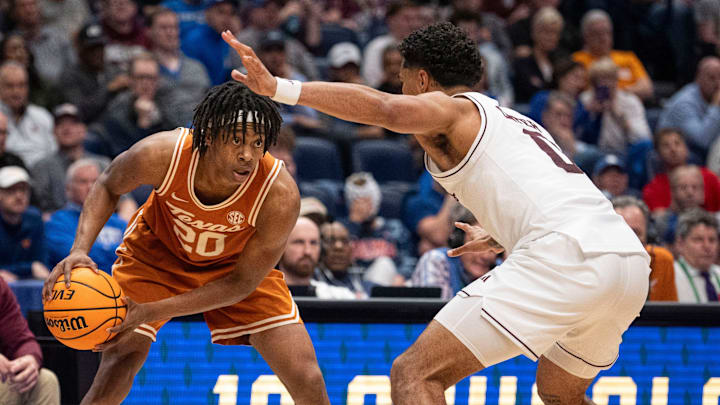 Texas Longhorns guard Tre Johnson (20) looks to pass during their second round game of the SEC Men's Basketball Tournament at Bridgestone Arena in Nashville, Tenn., Thursday, March 13, 2025. Texas Longhorns guard Tre Johnson (20) looks to pass during their second round game of the SEC Men's Basketball Tournament at Bridgestone Arena in Nashville, Tenn., Thursday, March 13, 2025.
