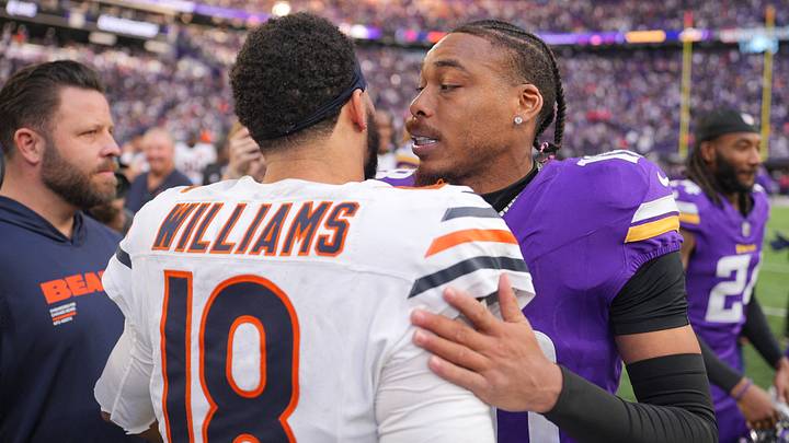 Nov 16, 2025; Minneapolis, Minnesota, USA; Chicago Bears quarterback Caleb Williams (18) greets Minnesota Vikings wide receiver Justin Jefferson (18) following a game at U.S. Bank Stadium. Mandatory Credit: Brad Rempel-Imagn Images