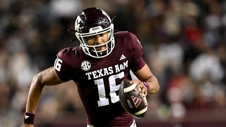 Nov 11, 2023; College Station, Texas, USA; Texas A&M Aggies quarterback Jaylen Henderson (16) runs the ball into the end zone for a touchdown during the second quarter against the Mississippi State Bulldogs at Kyle Field. Mandatory Credit: Maria Lysaker-Imagn Images
