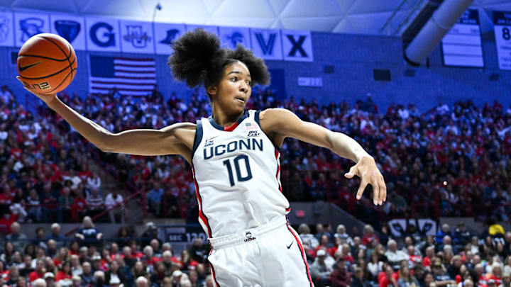 Nov 20, 2024; Storrs, Connecticut, USA; Connecticut Huskies guard Qadence Samuels (10) leaps to keep the ball inbounds during the second half against the Fairleigh Dickinson Knights at Harry A. Gampel Pavilion. Mandatory Credit: Mark Smith-Imagn Images Nov 20, 2024; Storrs, Connecticut, USA; Connecticut Huskies guard Qadence Samuels (10) leaps to keep the ball inbounds during the second half against the Fairleigh Dickinson Knights at Harry A. Gampel Pavilion. Mandatory Credit: Mark Smith-Imagn Images