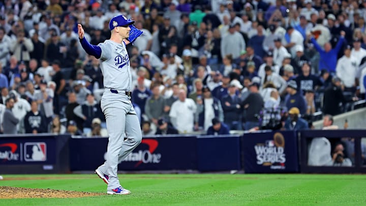 Oct 30, 2024; New York, New York, USA; Los Angeles Dodgers pitcher Walker Buehler (21) celebrates after beating the New York Yankees in game four to win the 2024 MLB World Series at Yankee Stadium. Oct 30, 2024; New York, New York, USA; Los Angeles Dodgers pitcher Walker Buehler (21) celebrates after beating the New York Yankees in game four to win the 2024 MLB World Series at Yankee Stadium.