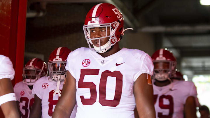 Sep 18, 2021; Gainesville, Florida, USA; Alabama Crimson Tide defensive lineman Tim Smith (50) against the Florida Gators at Ben Hill Griffin Stadium. Mandatory Credit: Mark J. Rebilas-Imagn Images Sep 18, 2021; Gainesville, Florida, USA; Alabama Crimson Tide defensive lineman Tim Smith (50) against the Florida Gators at Ben Hill Griffin Stadium. Mandatory Credit: Mark J. Rebilas-Imagn Images