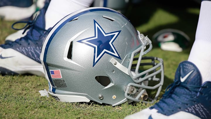 Nov 15, 2015; Tampa, FL, USA; A general view of Dallas Cowboys helmet on the field during the second half at Raymond James Stadium. Tampa Bay Buccaneers defeated the Dallas Cowboys 10-6. Mandatory Credit: Kim Klement-Imagn Images