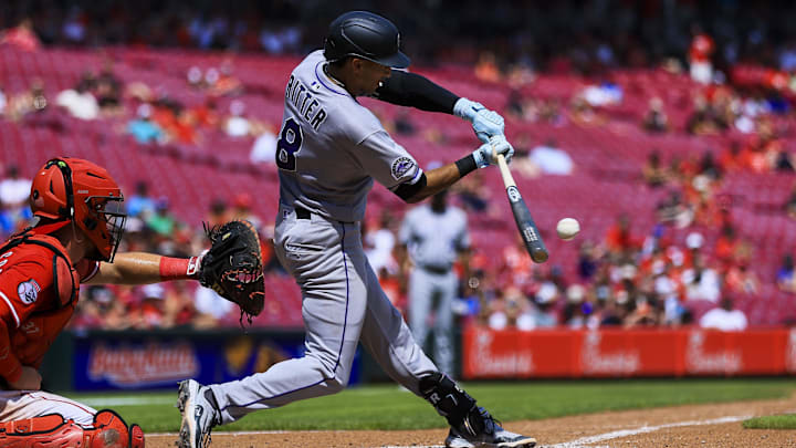 Jul 13, 2025; Cincinnati, Ohio, USA; Colorado Rockies shortstop Ryan Ritter (8) hits a single in the seventh inning against the Cincinnati Reds at Great American Ball Park.