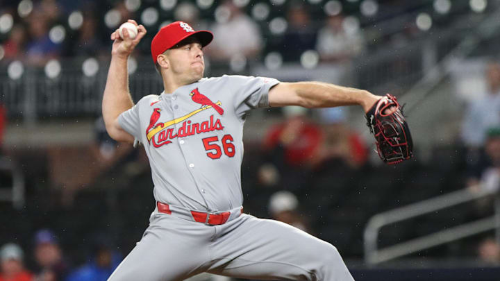 Apr 22, 2025; Cumberland, Georgia, USA; St. Louis Cardinals pitcher Ryan Helsley (56) pitches the ball against the Atlanta Braves during the ninth inning at Truist Park. Mandatory Credit: Jordan Godfree-Imagn Images